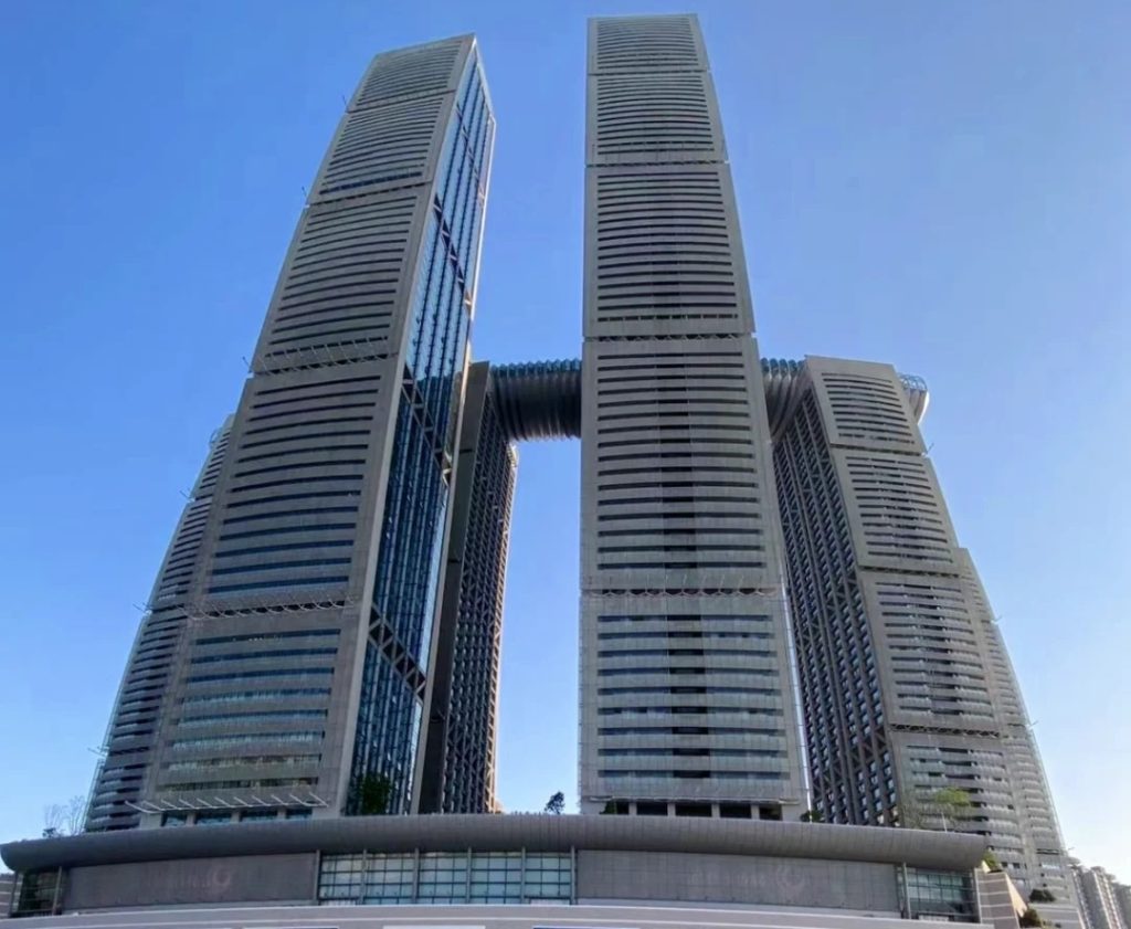 Raffles City as seen from a low-angle shot at Chaotianmen Square.