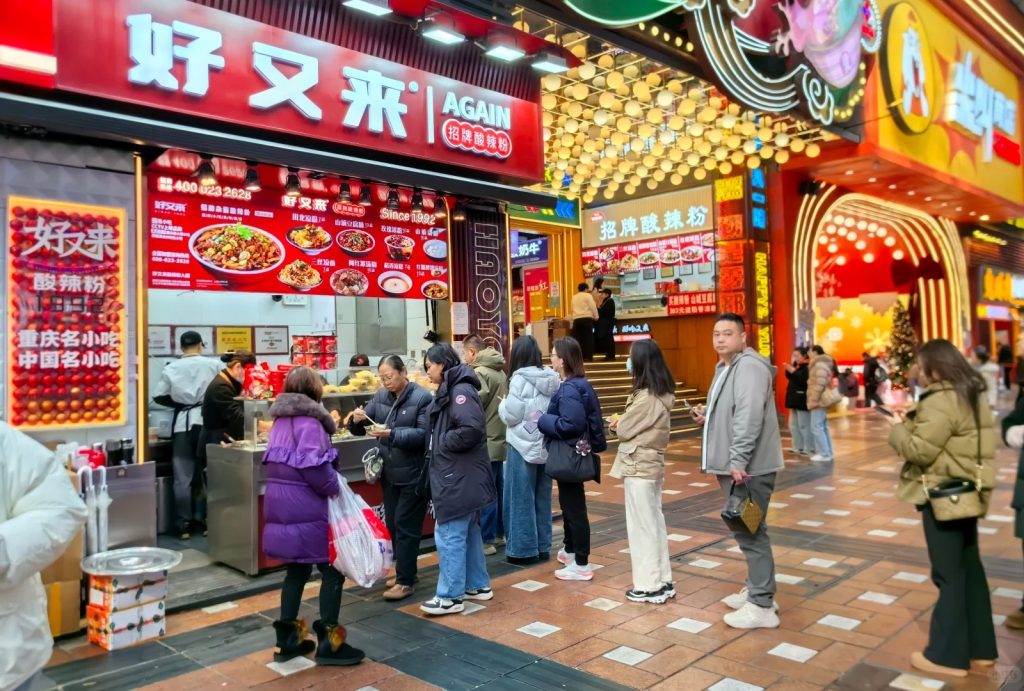 Diners queued outside for the signature sour and spicy noodles.