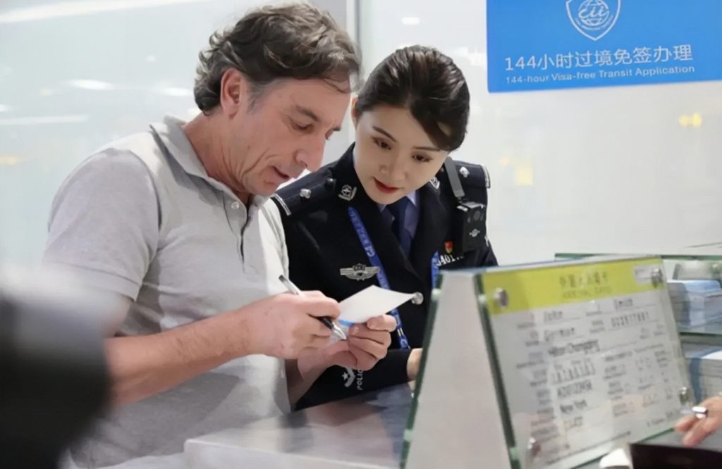 Staff assist with visa-free policy procedures