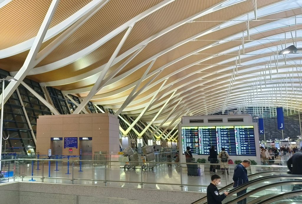 US to Chongqing via Shanghai