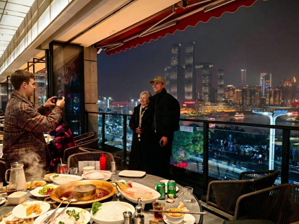 Snap stunning photos while enjoying hotpot with riverside views in Chongqing.