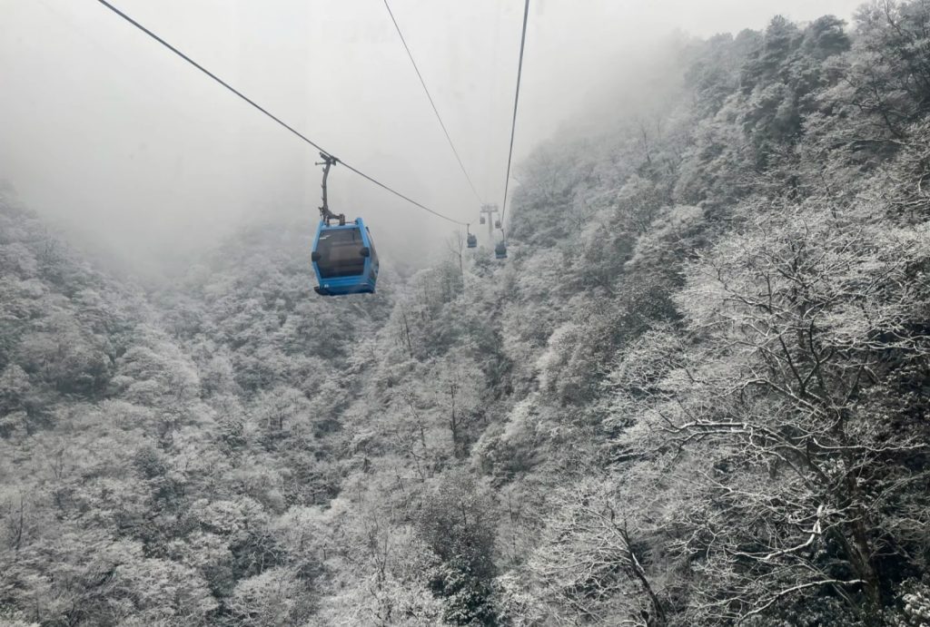 Take a cable car ride at Jinfo Mountain